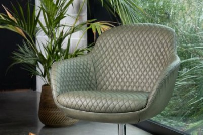 green-armchair-in-home